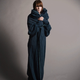 Illustration for article titled Ultimate Battle: The Snuggie vs. Slanket vs. Freedom Blanket vs. Blankoat